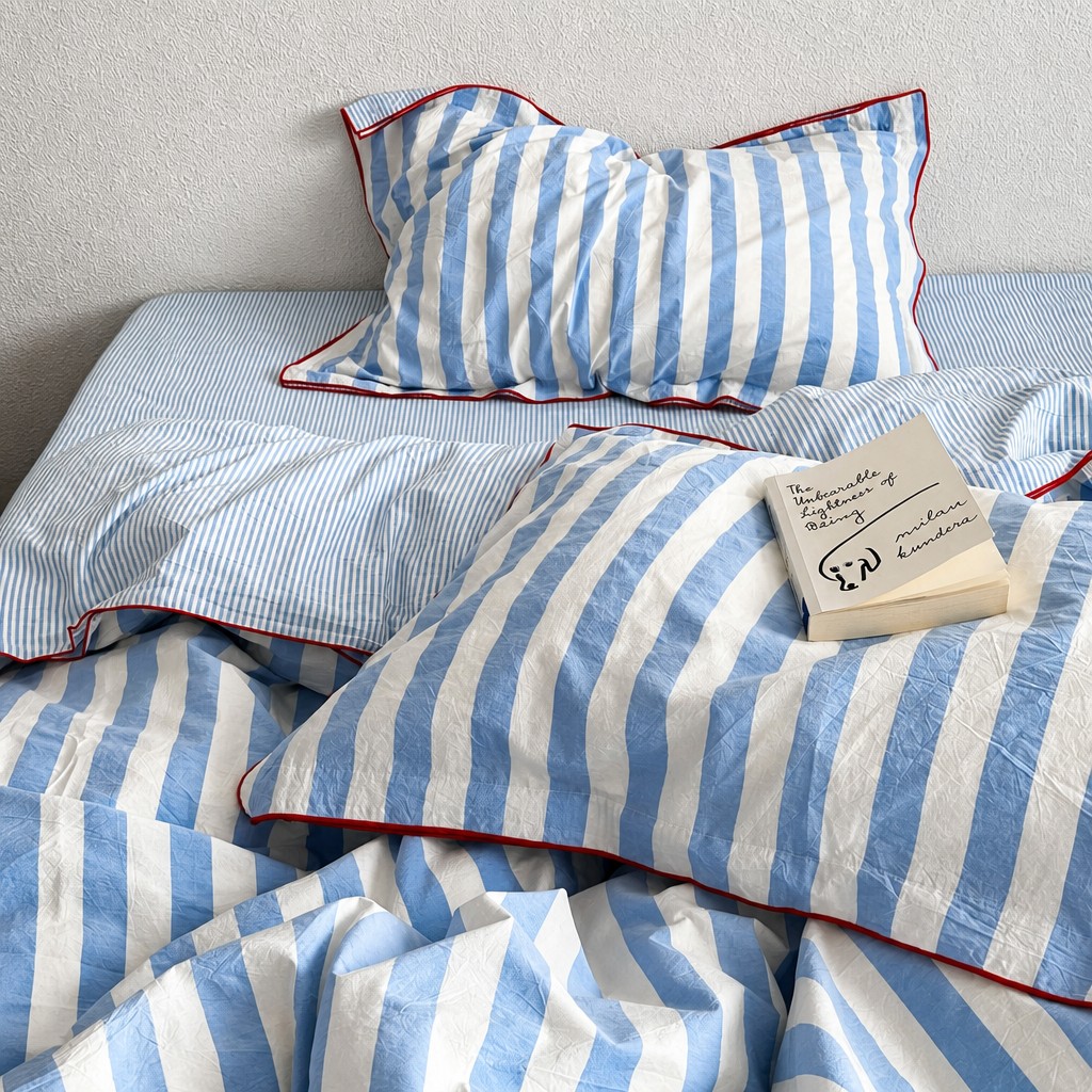 Striped bedding bedroom scene 1